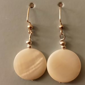 Mother of pearl earring.